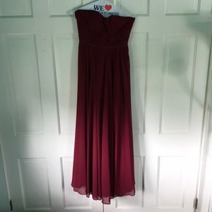 Corset back, strapless, magenta gown.